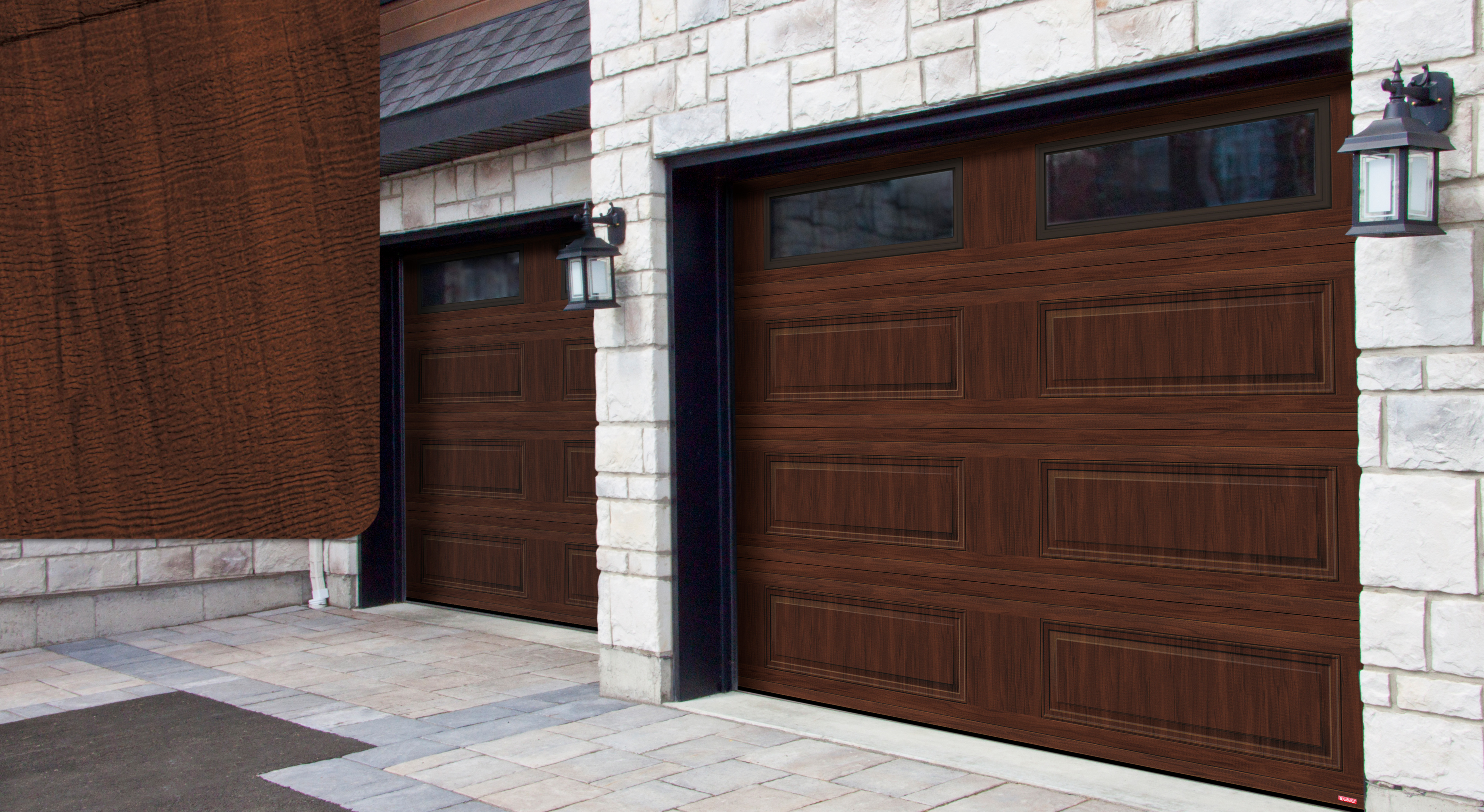 Grey stone house with Standard+ Classic XL garage doors, 9' x 7', American walnut with Clear windows and an American Walnut sample